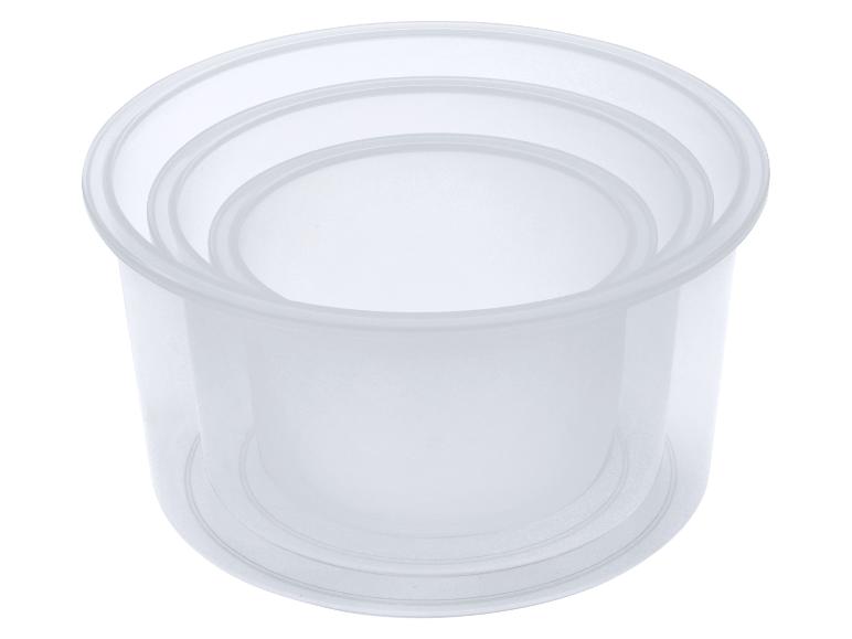 Récipient rond transparent pour aliments avec couvercle.