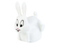 Un jouet de lapin blanc avec de grands yeux et un nez rose.