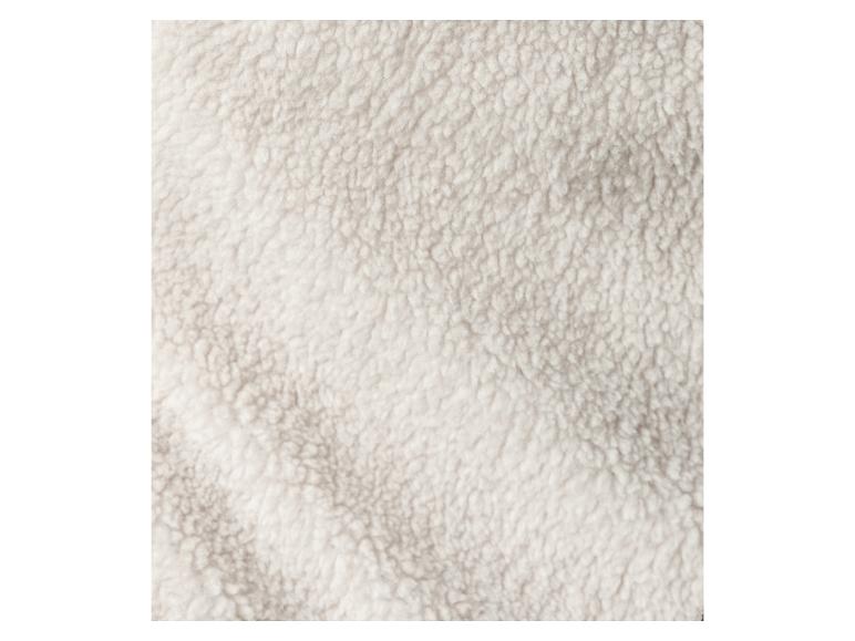 Texture de tissu polaire en peluche blanche.