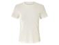 T-shirt blanc à manches courtes et à côtes.