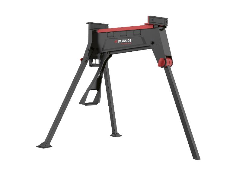 Un tréteau de travail pliable noir et rouge avec des pieds inclinés et une base stable.