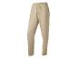 Pantalon de jogging beige pour homme avec taille élastique et cordon de serrage.