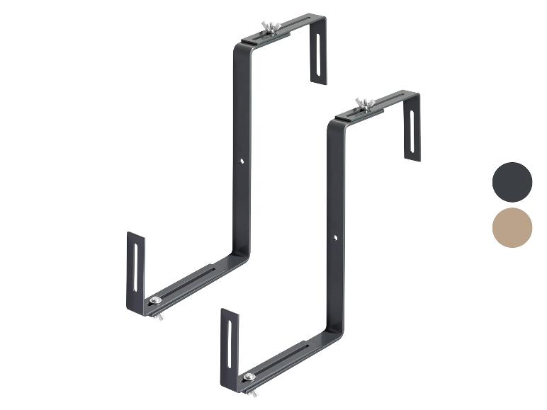 Deux supports de balcon noirs pour jardinières, avec des vis papillon.