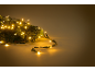 Guirlande lumineuse de Noël à LED blanc chaud sur une branche de pin