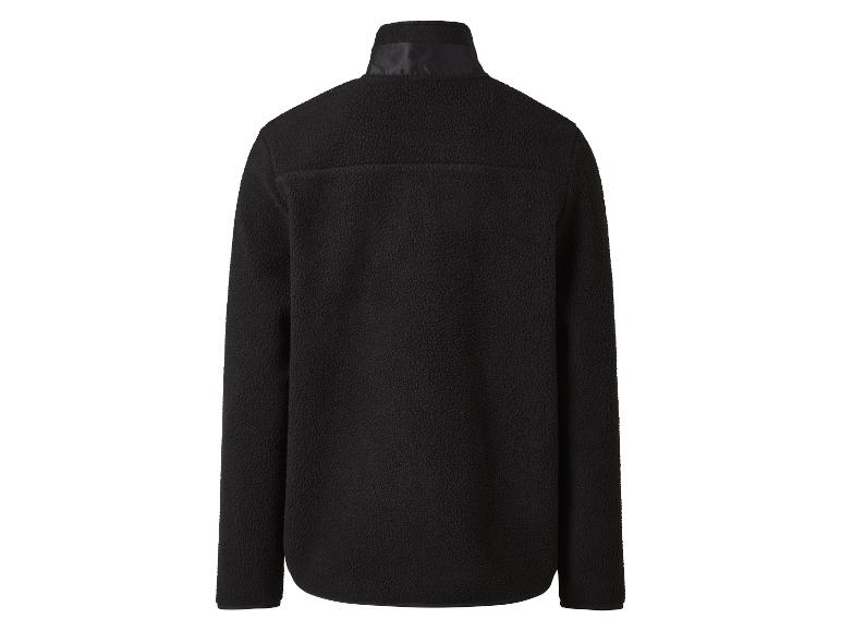 Blouson polaire noir à col montant.