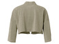 Une veste beige à paillettes avec des manches longues.