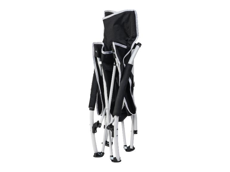 Chaise de camping pliante noire avec détails blancs, pliée verticalement.
