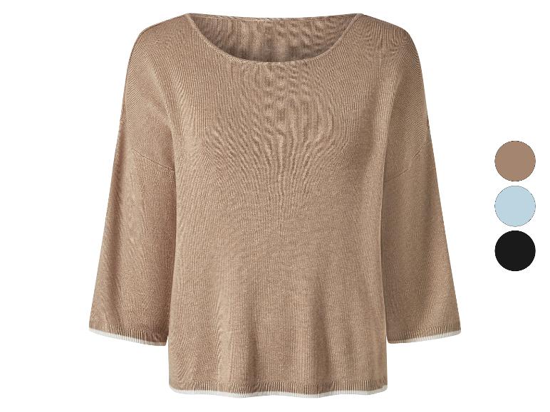 Pull tricoté beige à manches trois quarts avec des détails blancs.
