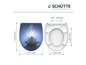 Un abattant de WC blanc et bleu avec un design de fleur de lotus de Schütte