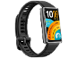 Montre connectée noire avec écran couleur rectangulaire et bracelet en silicone.