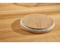 Couvercle en bambou avec joint en silicone sur une surface en bois.
