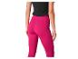 Leggings roses et haut noir pour le sport.