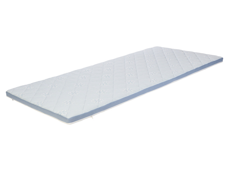 Un surmatelas bleu avec un motif de flocons de neige.