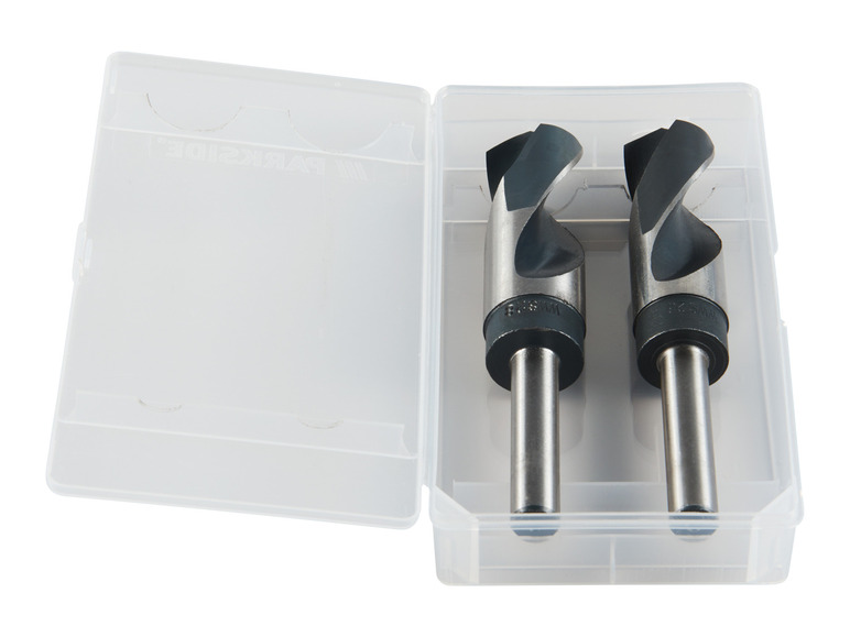 Deux mèches à forer dans une boîte en plastique transparente.