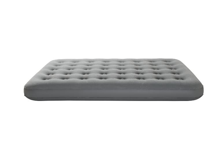 Matelas gonflable gris avec une surface capitonnée