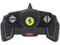 Télécommande noire pour voiture miniature avec logo jaune et boutons directionnels.