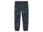 Pantalon de survêtement à carreaux bleus, verts et blancs.