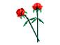 Deux roses rouges faites de briques Lego.