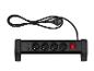 Multiprise noire avec quatre prises, deux ports USB et un interrupteur rouge.