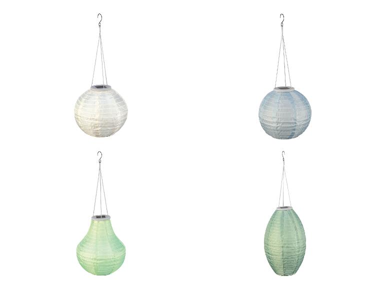 Lampes solaires suspendues : modèles sphériques et ovales, tons pastel.