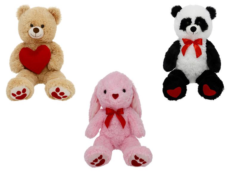 Ours en peluche, lapin en peluche et panda en peluche avec des cœurs rouges