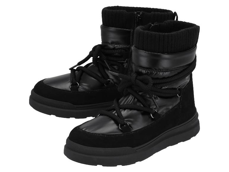 Bottes d'hiver noires avec lacets et col en tricot.