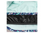 Une veste bleue avec un motif floral et une doublure noire.