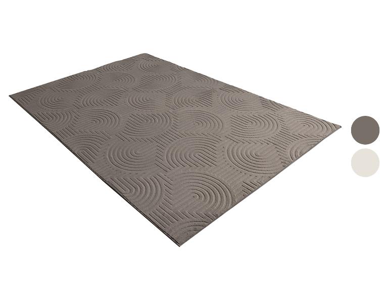 Tapis à motifs géométriques, tons gris.