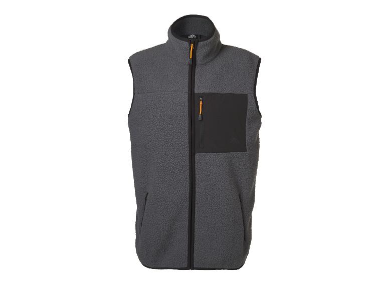 Gilet polaire gris avec fermetures éclair noires et accents orange.