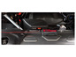 Un chargeur de batterie Ultimate Speed ​​connecté à une batterie de voiture.