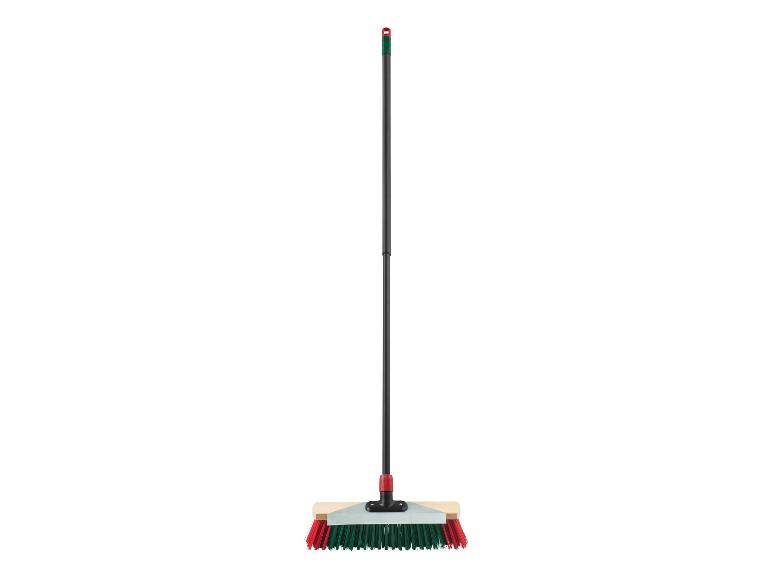 Balai avec manche noir et poils rouges et verts