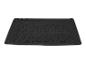Un tapis de coffre Ultimate noir avec un motif en losanges.