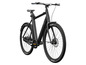 Un vélo électrique noir avec des pneus Kenda.