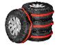 Housses de pneus noires Ultimate Speed avec sangles rouges, empilées.