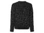 Un pull noir à paillettes.