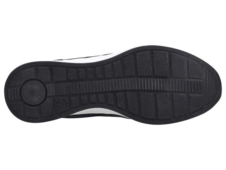 Semelle noire d'une chaussure de sport avec surface texturée et marquage de taille.