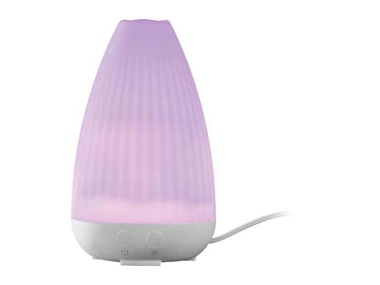 Diffuseur d'arômes violet avec surface nervurée et boutons de commande