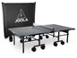 Une table de ping-pong Joola avec housse de protection.