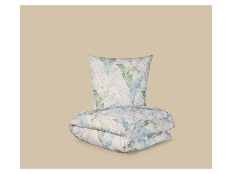 Parure de lit avec motif de feuilles dans des tons verts et bleus.