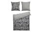 Un ensemble de literie avec un motif floral et des taies d'oreiller assorties.