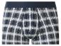 Boxer à carreaux bleus, verts et blancs avec ceinture élastique.
