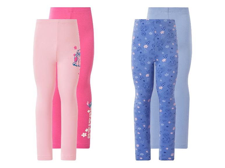 Lot de quatre leggings pour enfants : deux roses avec motif alien et deux bleus avec motif princesse.