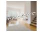Luminaire sur rail de plafond BRILONER avec six spots dans un salon.