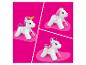Jeu de construction Mega Bloks avec trois figurines d'animaux différentes en rose et blanc.