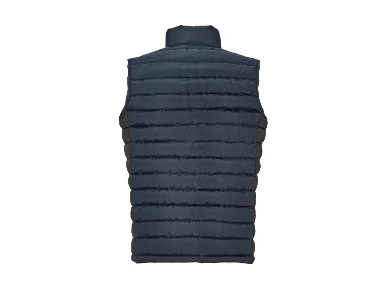 Un gilet matelassé bleu foncé sans manches.