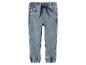 Pantalon jogger en jean bleu clair pour enfants avec cordon de serrage à la taille et poignets élastiques.