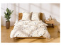 Un lit avec une couette blanche à motifs floraux.