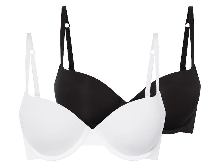 Deux soutiens-gorge noirs et blancs avec des bonnets lisses.