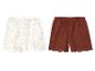 Shorts enfant : modèle fleuri et modèle marron à découpes.