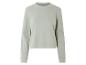 Sweat-shirt vert clair à manches longues.